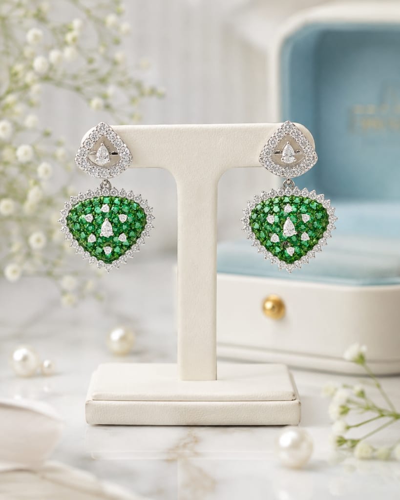 Floating Collection emerald and diamond drop earrings showcase