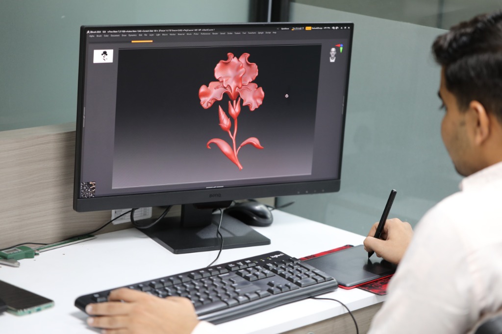 Master CAD designer sculpting 3D floral iris jewellery motif in ZBrush