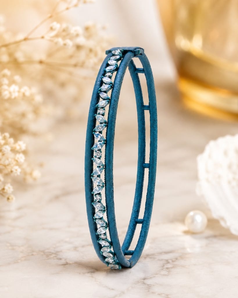 Titanium Womens anodized blue titanium bangle bracelet with marquise diamond accents